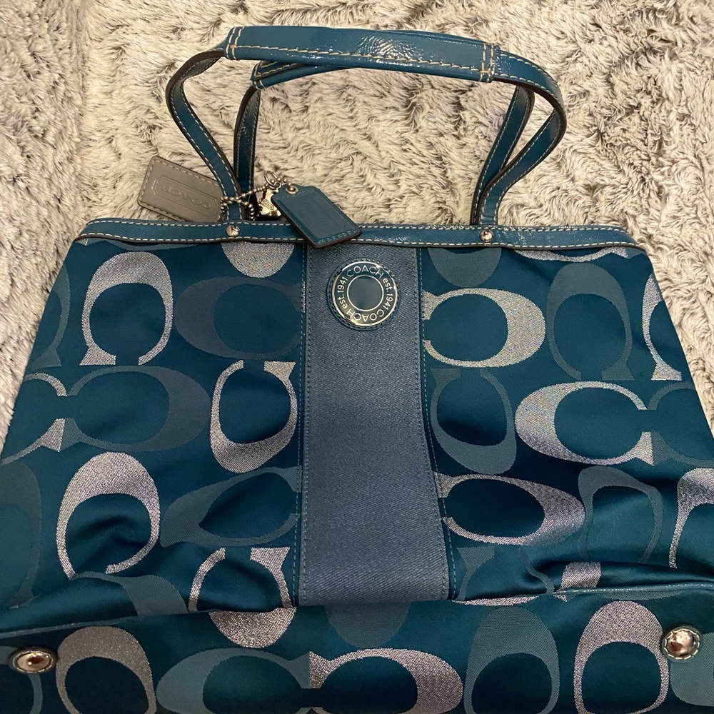 Coach Signature Stripe Framed Tote
Blue with Silver Accents with a Kiss Lock